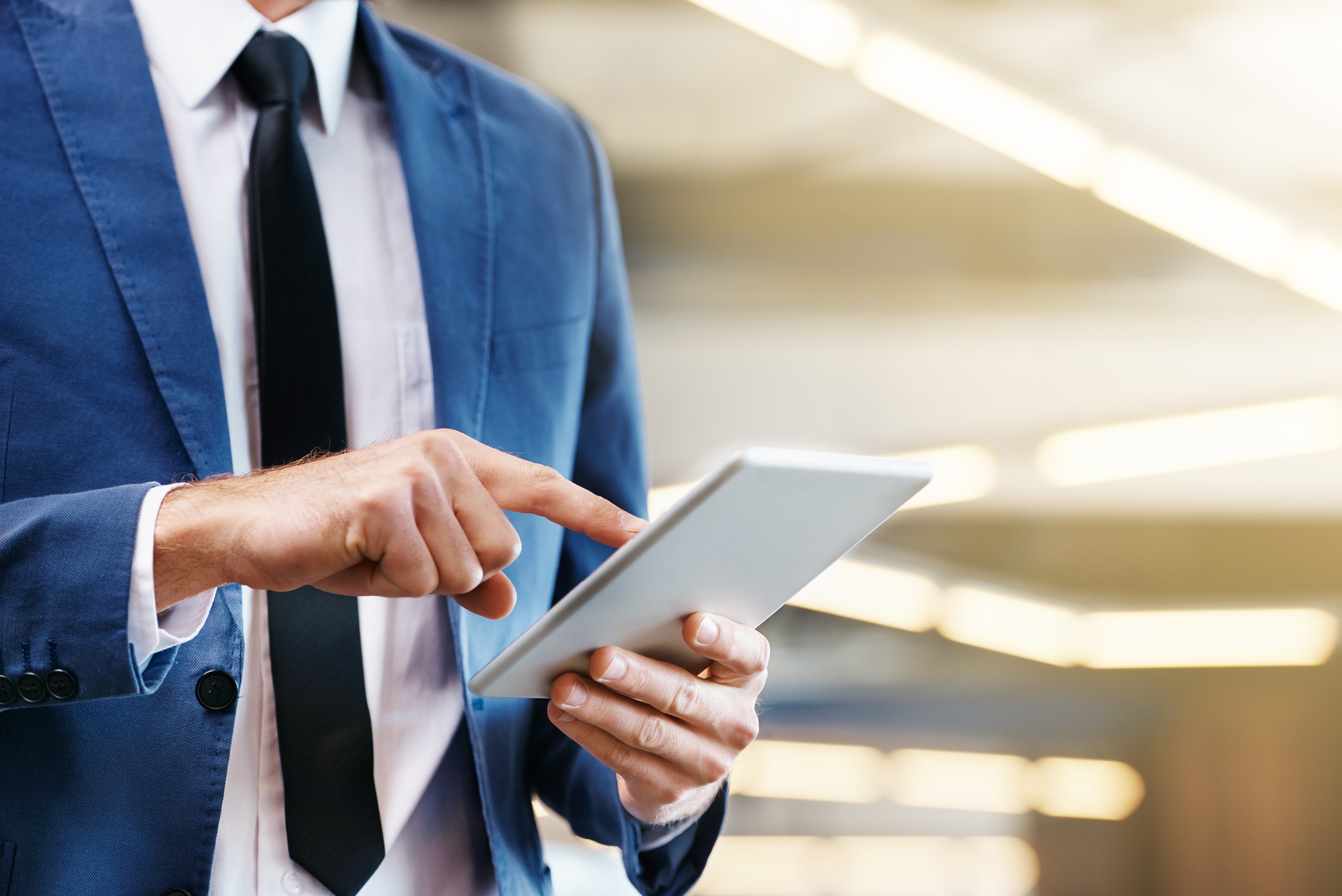 Businessperson Using a Tablet